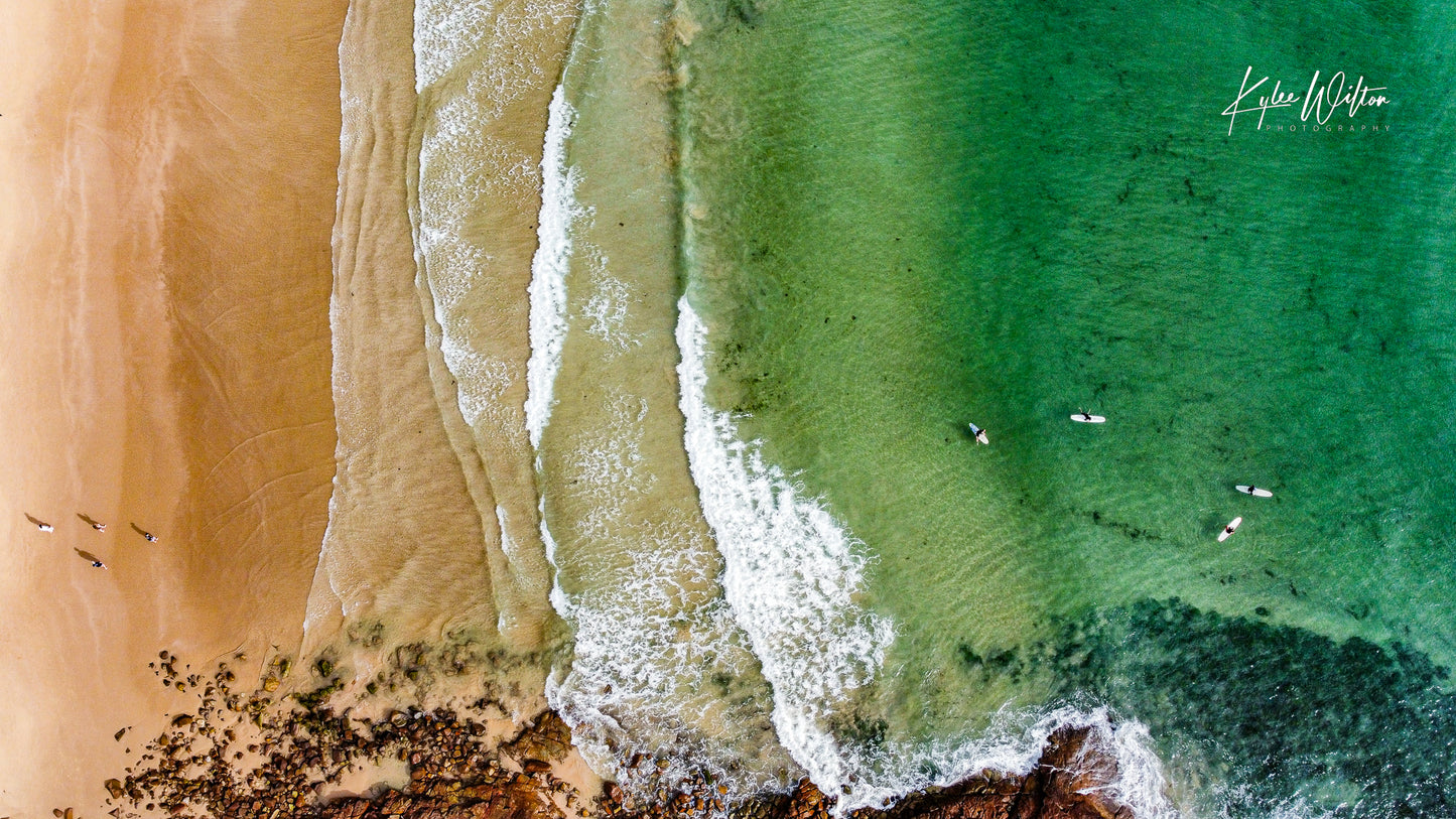 One Mile Beach surfers, Port Stephens, Australia, in December 2024.